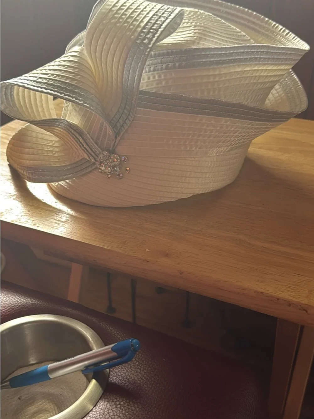 Elegant White and Silver Women's Dress Hat with Bow Accent